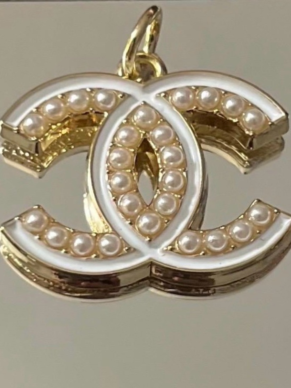 CHANEL Gold-Tone CC Pendant with White Enamel & Pearl Accents
